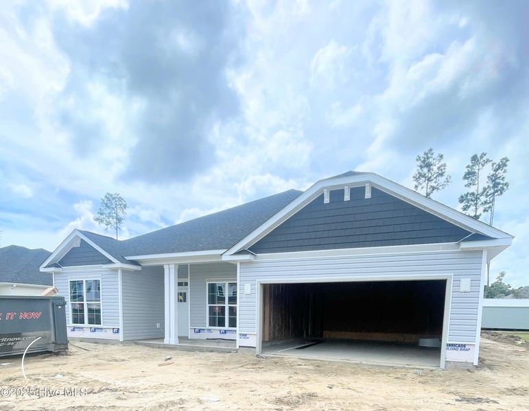 Exterior details and patio area of a home in Athens Acres, New Bern (Image 2).