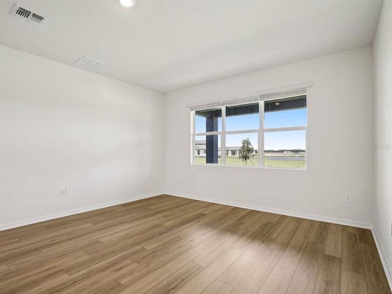 Spacious, unfurnished interior of a new home in Coasterra - Reserve Series, Palmetto (Image 28).