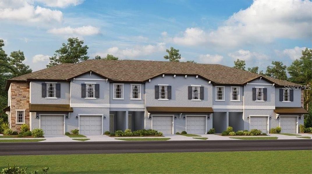 Front exterior of a new home in , Land O' Lakes, FL, highlighting curb appeal (Image 1).