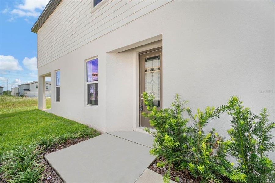 Exterior details and patio area of a home in Sol Vista, Dundee (Image 27). Exterior details and patio area of a home in Sol Vista, Dundee (Image 27).