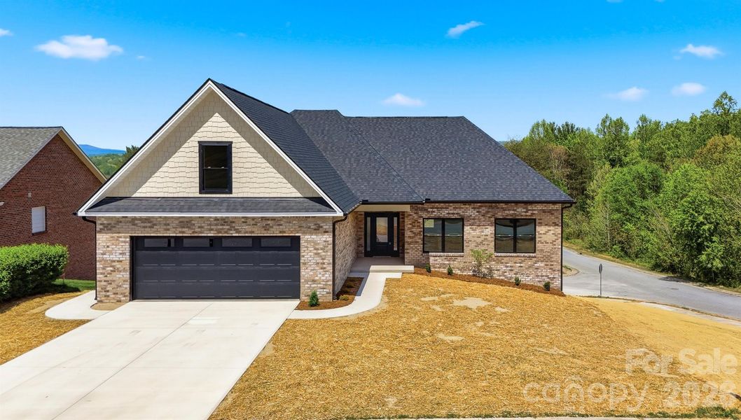 Front exterior of a new home in , Lenoir, NC, highlighting curb appeal (Image 23).