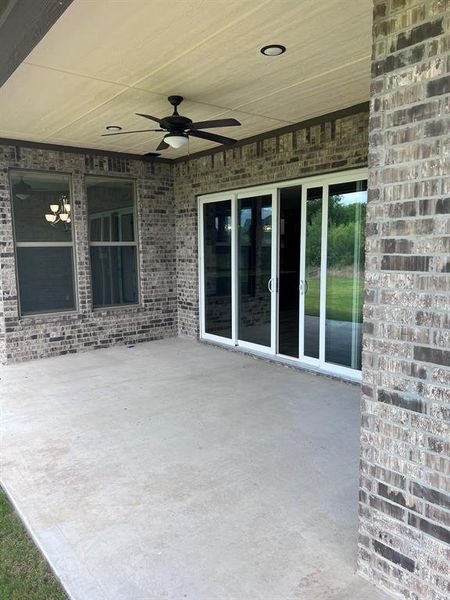 View of patio with ceiling fan