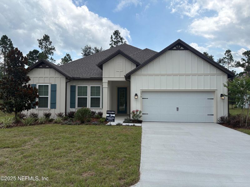Front exterior of a new home in Stables at Cary Forest, Bryceville, FL, highlighting curb appeal (Image 1).