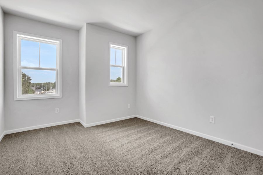 Spacious, unfurnished interior of a new home in Towne Village at Suwanee Dam, Sugar Hill (Image 26).