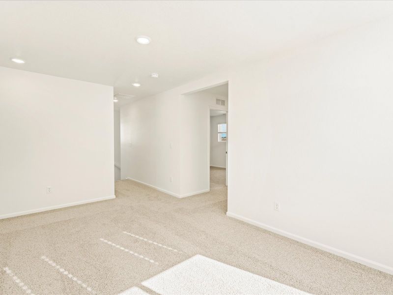 Spacious, unfurnished interior of a new home in Lorson Ranch: The Trail Collection, Colorado Springs (Image 8).