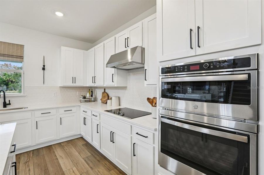 Furnished interior view inside a new home in Hawks Run, Kissimmee (Image 6).