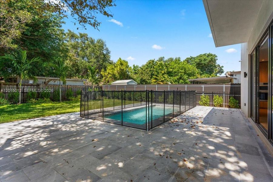 Exterior details and patio area of a home in , Miami (Image 3).