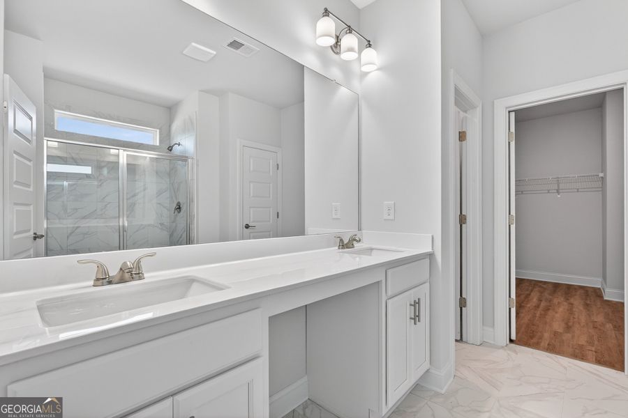 Furnished interior view inside a new home in Stone Brooke, Gray (Image 7).
