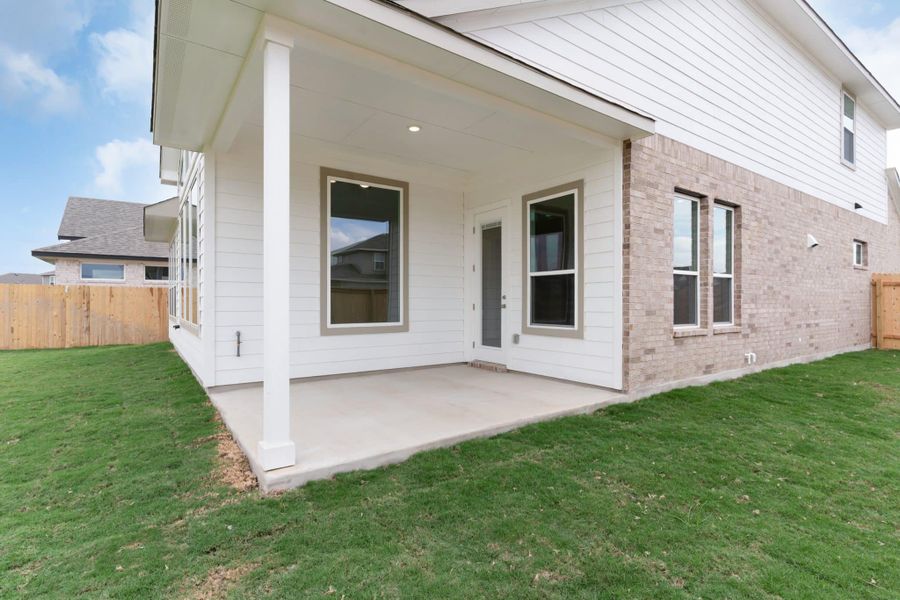 Exterior details and patio area of a home in University Heights, Round Rock (Image 3).