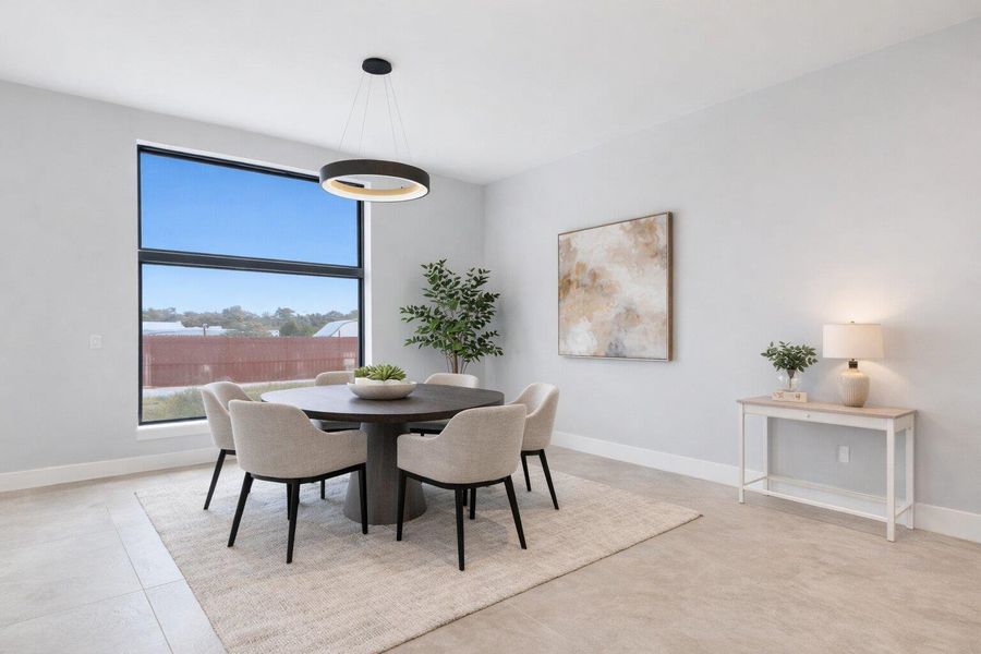 Dining space featuring baseboards