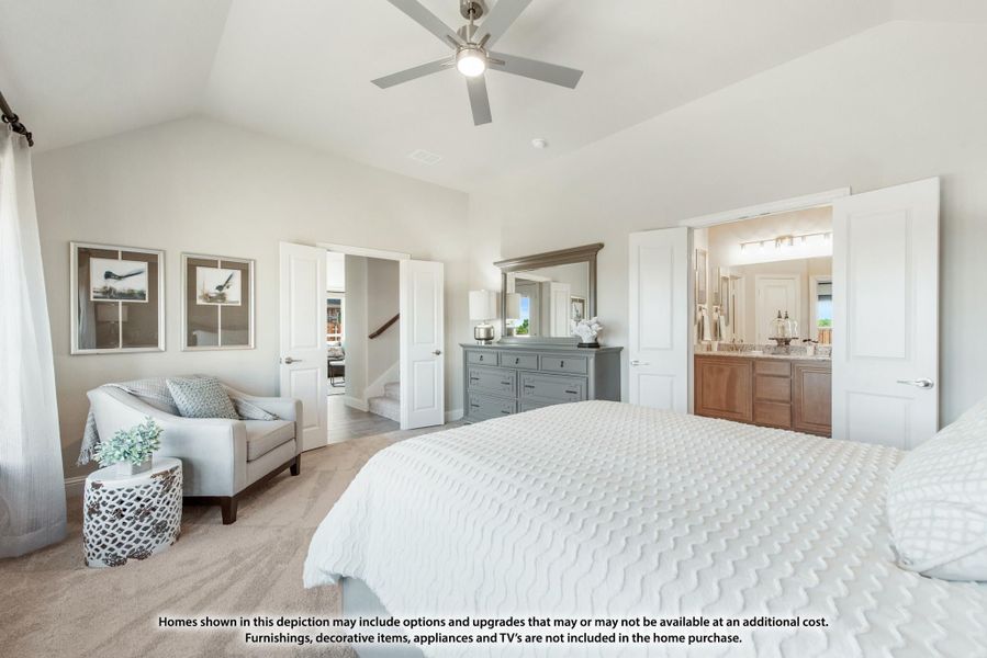 Master bedroom with vaulted ceiling, ceiling fan, and ensuite bathroom visible through open door Master bedroom with vaulted ceiling, ceiling fan, and ensuite bathroom visible through open door