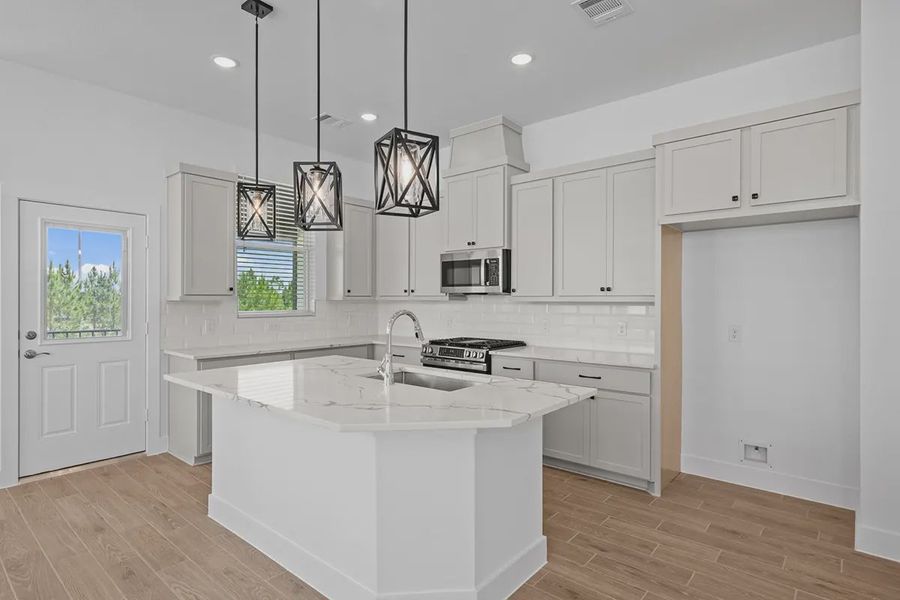 Furnished interior view inside a new home in Bridgeland Chateaus, Cypress (Image 7).