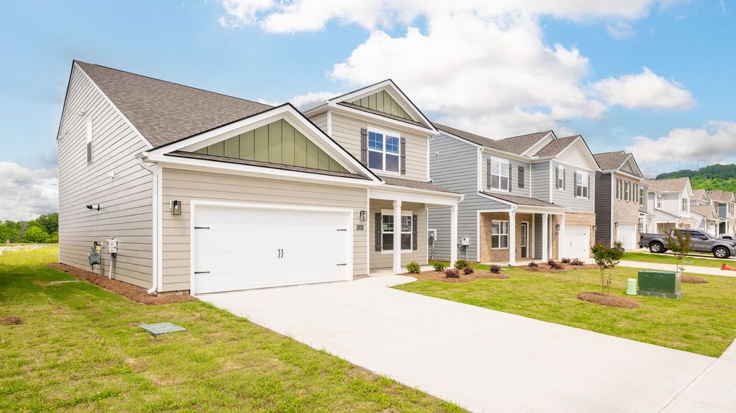 Front exterior of a new home in Harbor Crest, Ooltewah, TN, highlighting curb appeal (Image 2).