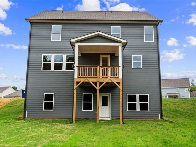Exterior details and patio area of a home in Wehunt Meadows, Hoschton (Image 24).