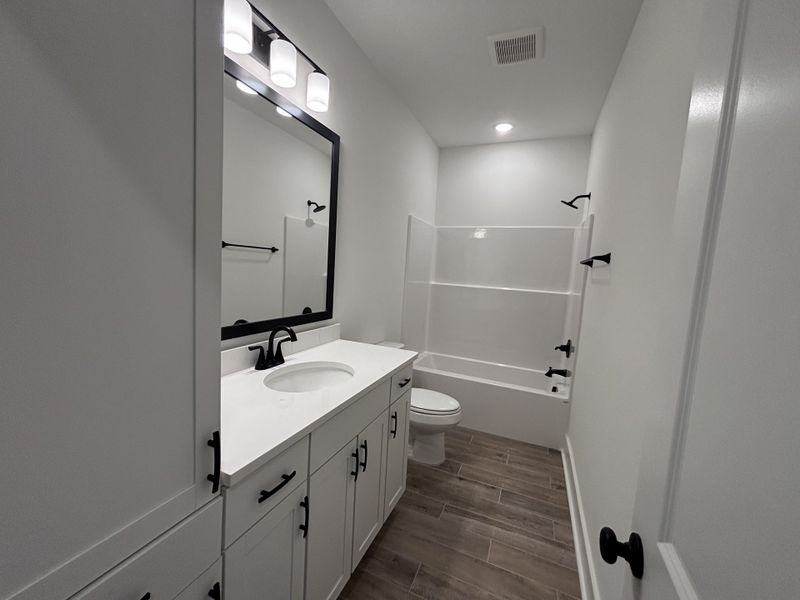 Furnished interior view inside a new home in Bird Song at Hammock Bay, Freeport (Image 14).