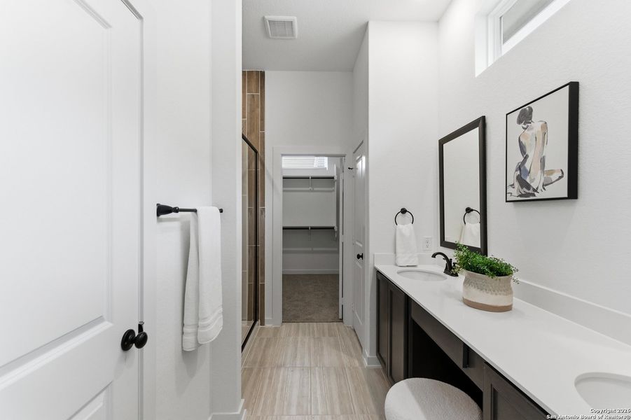 Furnished interior view inside a new home in The Crossvine, Schertz (Image 32).