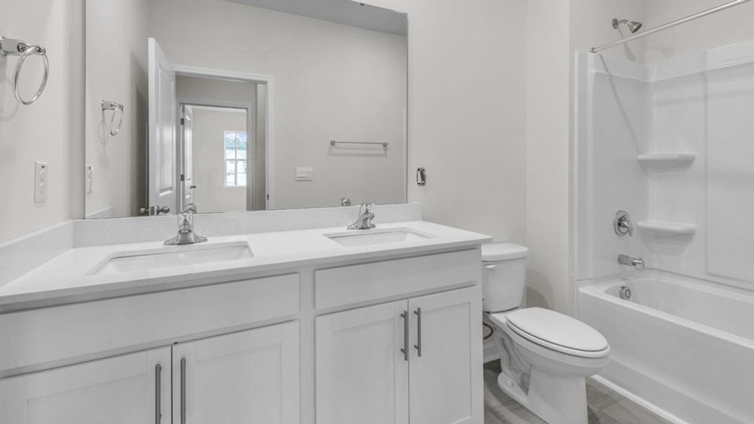Furnished interior view inside a new home in Cross Creek, Spring Lake (Image 9).