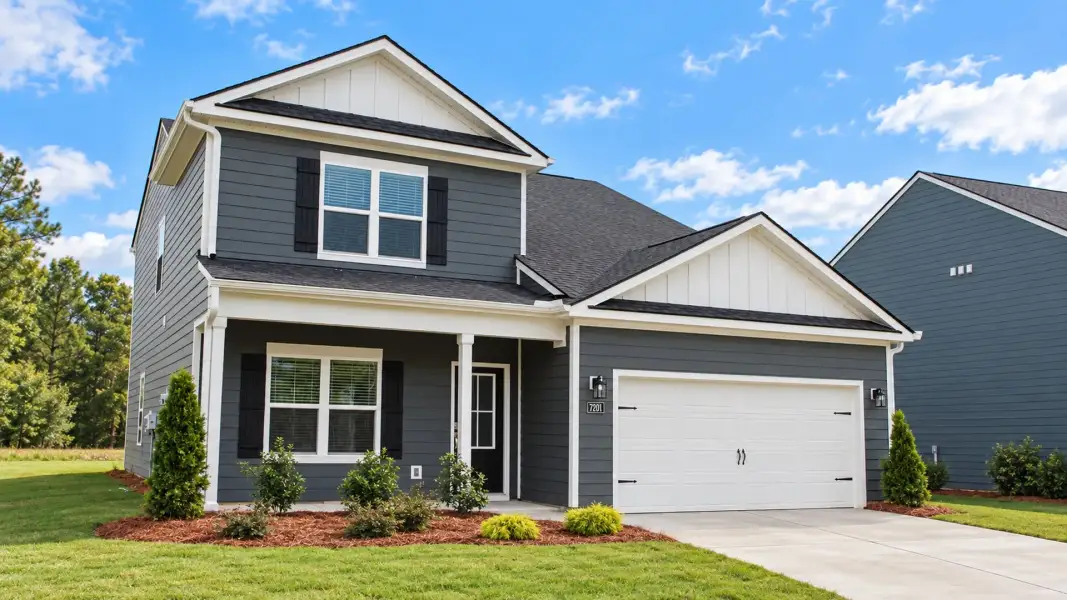 Front exterior of a new home in The Hideaway at Edgestone, Ooltewah, TN, highlighting curb appeal (Image 18). Front exterior of a new home in The Hideaway at Edgestone, Ooltewah, TN, highlighting curb appeal (Image 18).