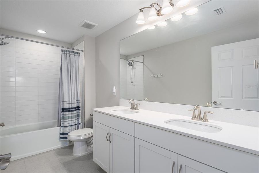 Furnished interior view inside a new home in Crosswind Point, Parrish (Image 11).