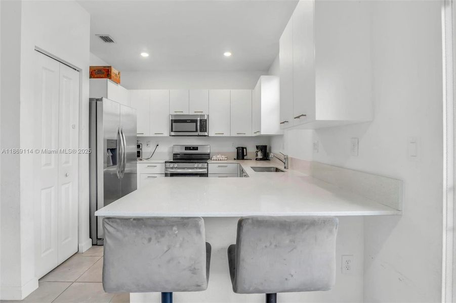 Furnished interior view inside a new home in , Miami (Image 11).