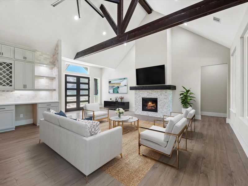 Virtually staged living space with cozy fireplace. Virtually staged living space with cozy fireplace.