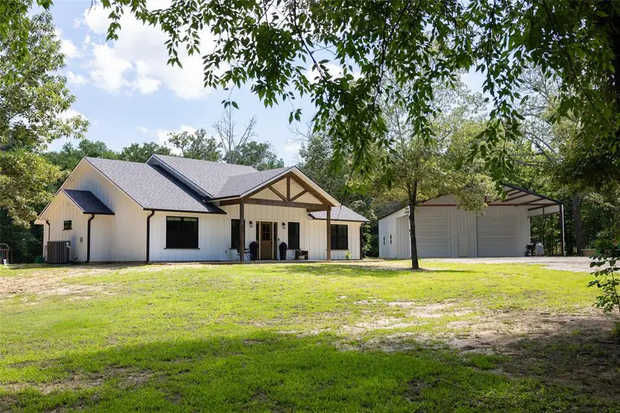 Exterior details and patio area of a home in , Powderly (Image 3).