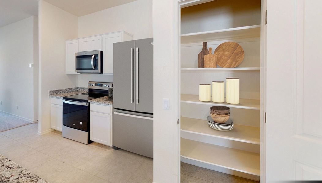 Representative furnished interior of a home built from the Sterling by Starlight Homes in Magma Ranch Vistas, Florence (Image 5).