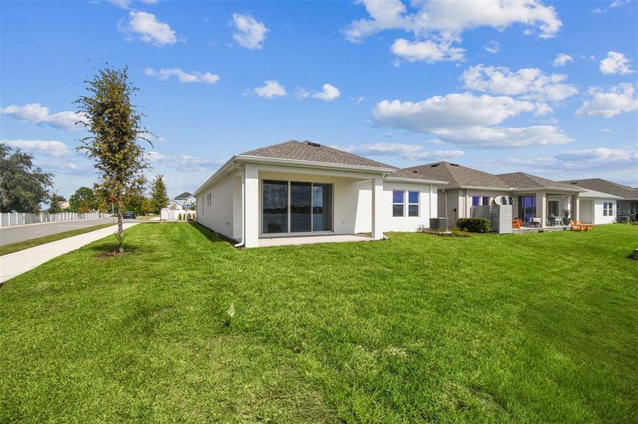 Exterior details and patio area of a home in The Peninsula at Rhodine Lake, Riverview (Image 2).