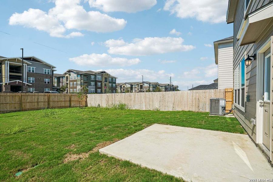 Exterior details and patio area of a home in Medina Crossing, Von Ormy (Image 3).