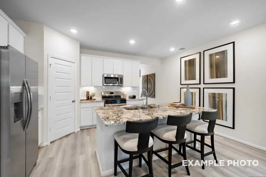 Furnished interior view inside a new home in Agave, San Antonio (Image 18).