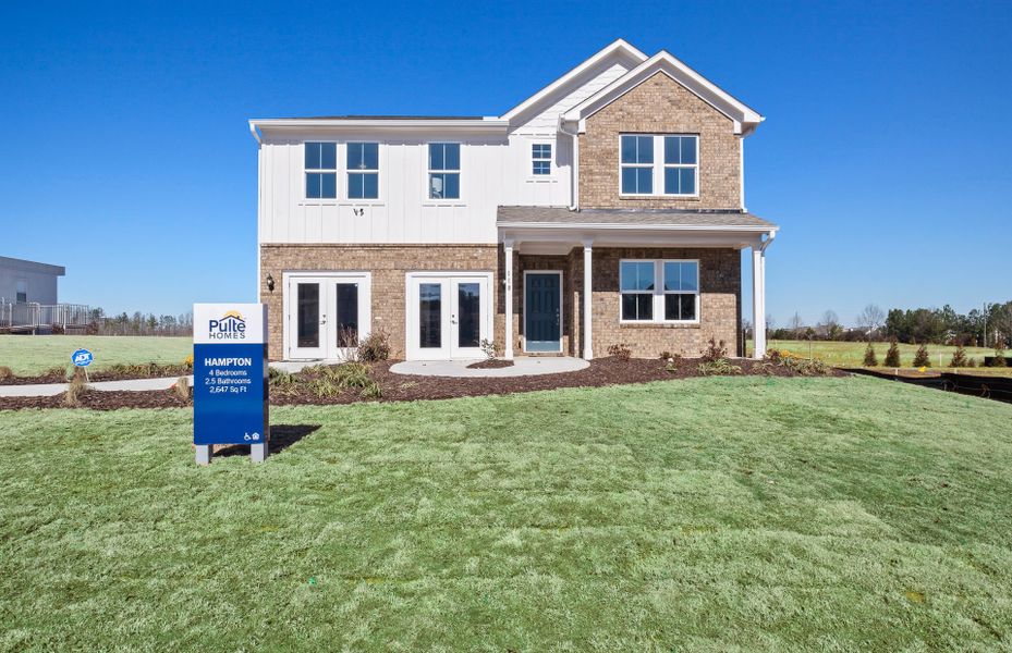 Front exterior of a new home in Anderson Point, McDonough, GA, highlighting curb appeal (Image 2).