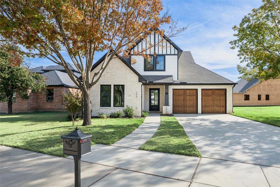 Front exterior of a new home in , Roanoke, TX, highlighting curb appeal (Image 1).