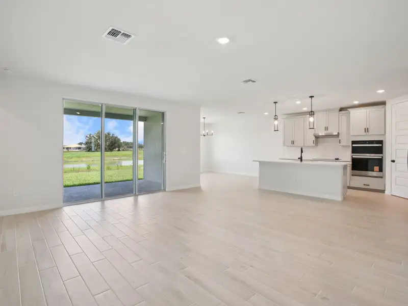 Spacious, unfurnished interior of a new home in Two Rivers - Signature Series, Zephyrhills (Image 6).