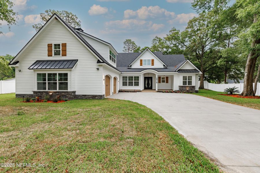 Front exterior of a new home in , Jacksonville, FL, highlighting curb appeal (Image 23).