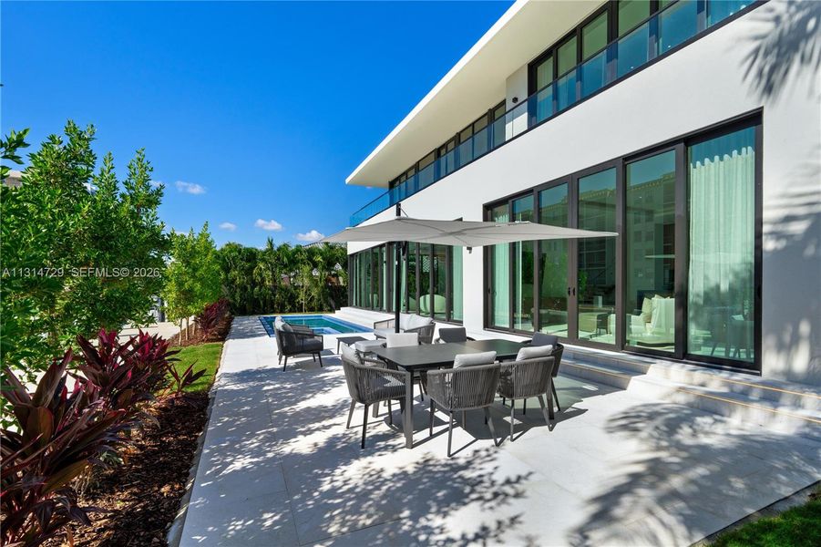 Exterior details and patio area of a home in , North Miami Beach (Image 24).