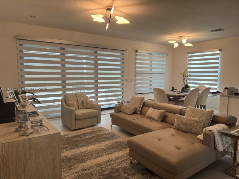 Furnished interior view inside a new home in , Port St. Lucie (Image 6).