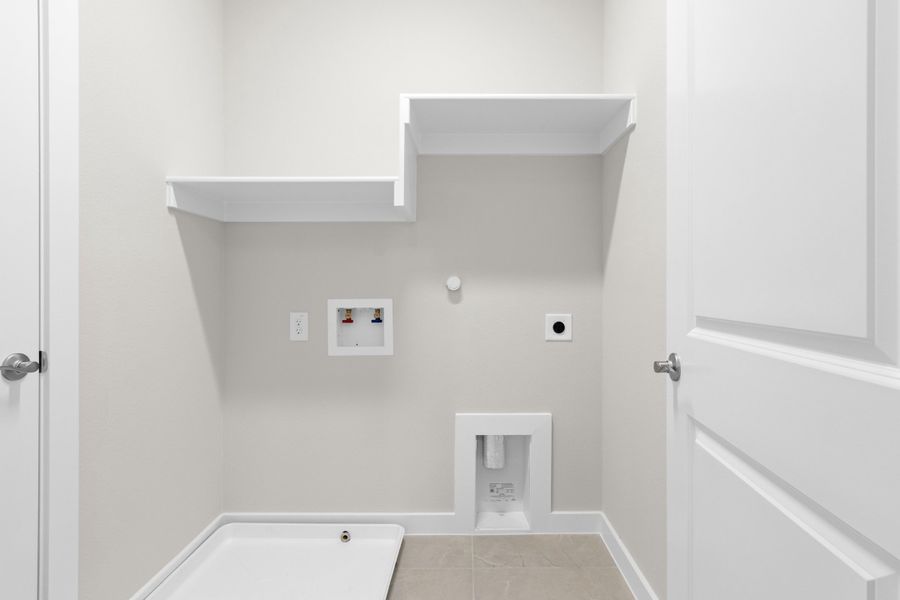 Spacious, unfurnished interior of a new home in The Tribute, The Colony (Image 44).