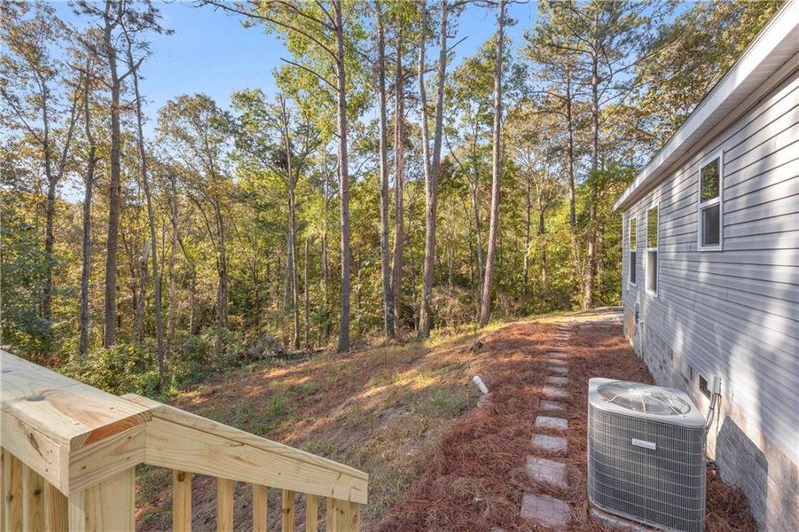 Exterior details and patio area of a home in , Ball Ground (Image 27).