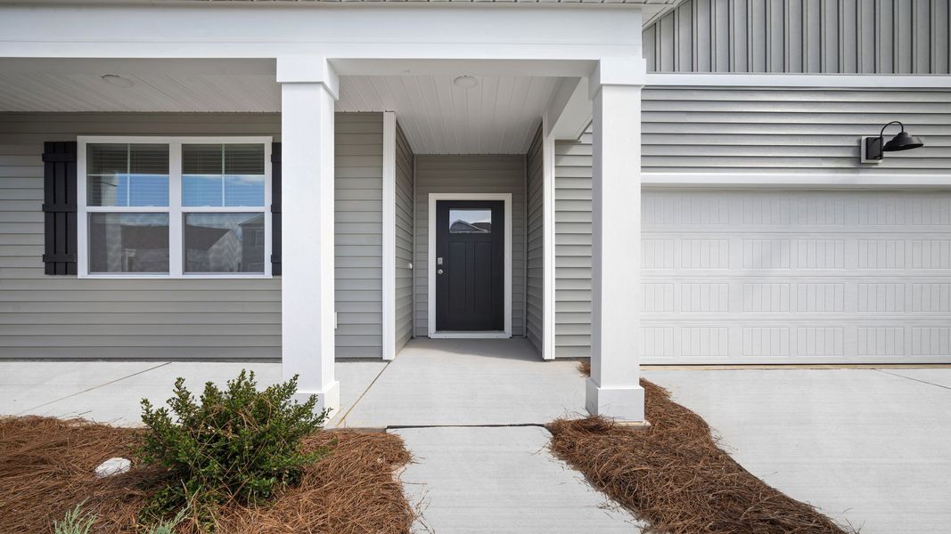 Exterior details and patio area of a home in The Retreat at East Argent, Ridgeland (Image 2). Exterior details and patio area of a home in The Retreat at East Argent, Ridgeland (Image 2).