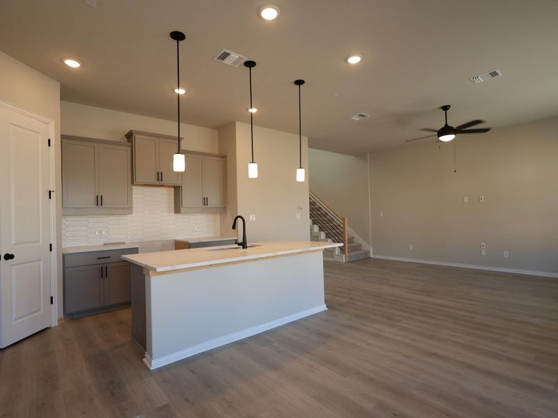 Furnished interior view inside a new home in Heritage, Dripping Springs (Image 6).