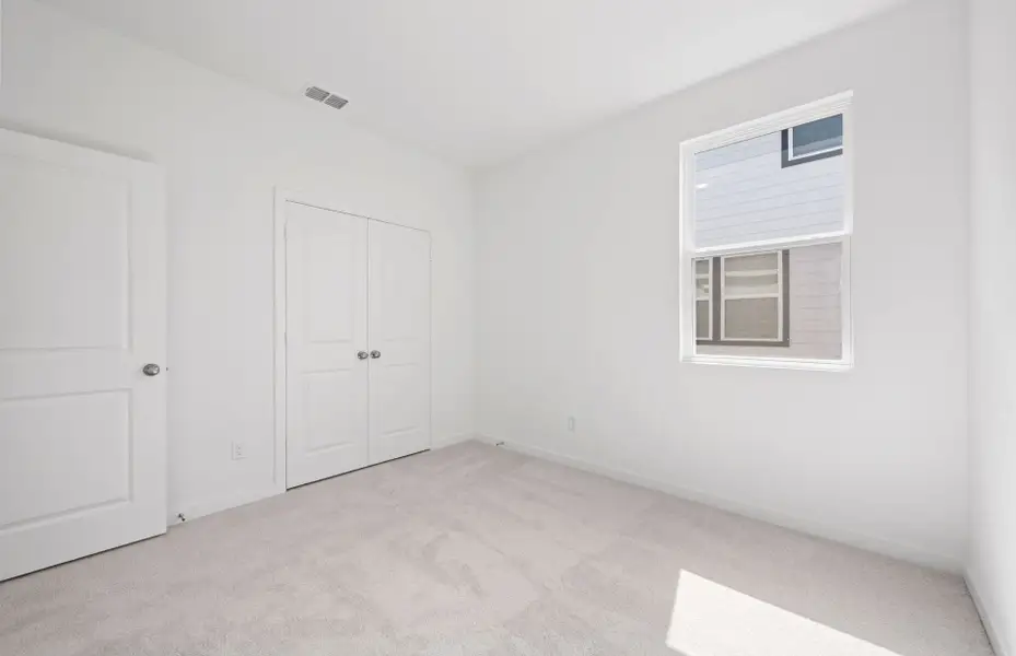 Spacious, unfurnished interior of a new home in Sunfield, Buda (Image 27). Spacious, unfurnished interior of a new home in Sunfield, Buda (Image 27).