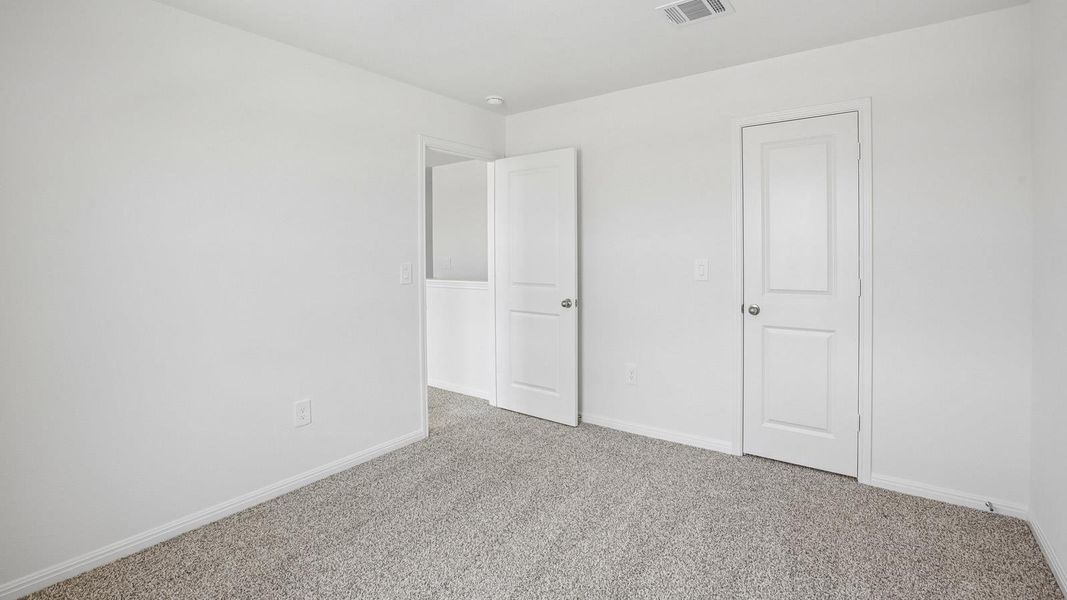 Spacious, unfurnished interior of a new home in Bar W Ranch, Leander (Image 36).