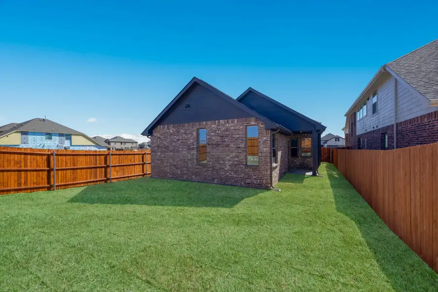 Exterior details and patio area of a home in Heartland, Heartland (Image 3).