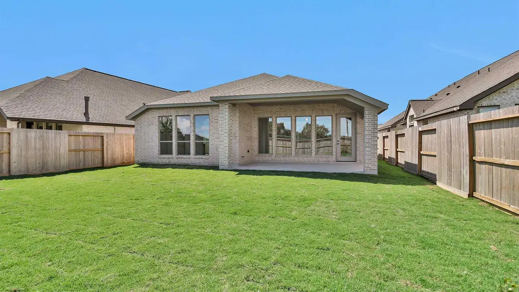 Exterior details and patio area of a home in Candela South 50', Richmond (Image 1).