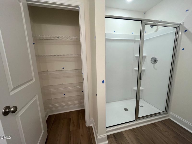 Walk in Shower and Private linen closet