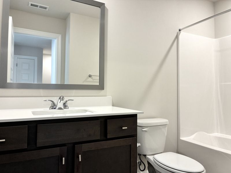 Furnished interior view inside a new home in Holly Ridge, Greenville (Image 10).