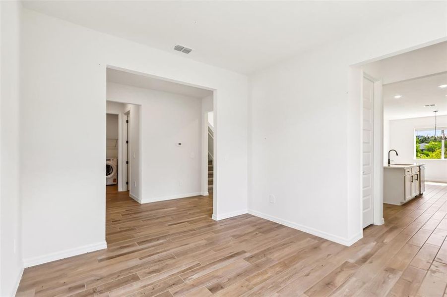 Spacious, unfurnished interior of a new home in The Grove at Stuart Crossing - Signature Series, Bartow (Image 23).