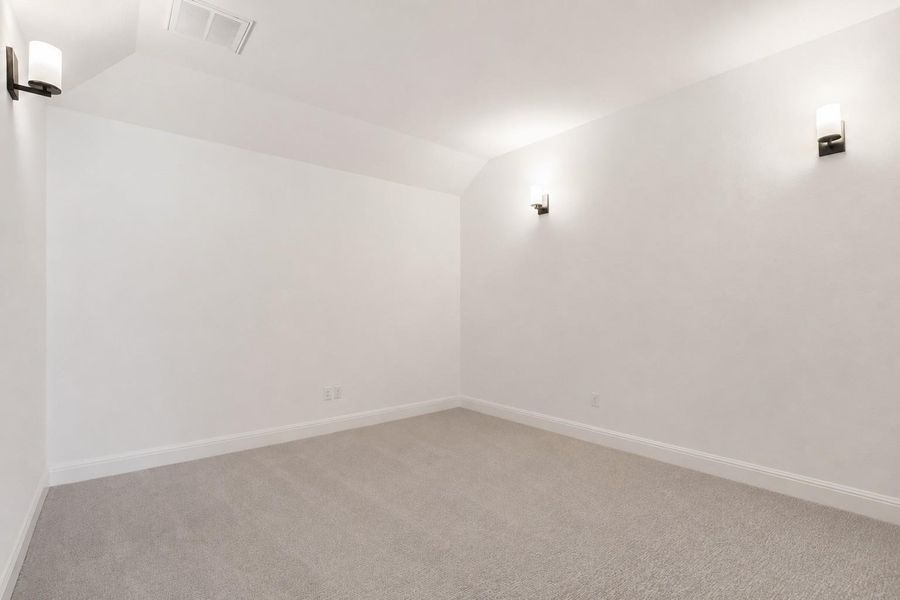 An inviting room offering versatility with neutral walls and soft carpeting. An inviting room offering versatility with neutral walls and soft carpeting.