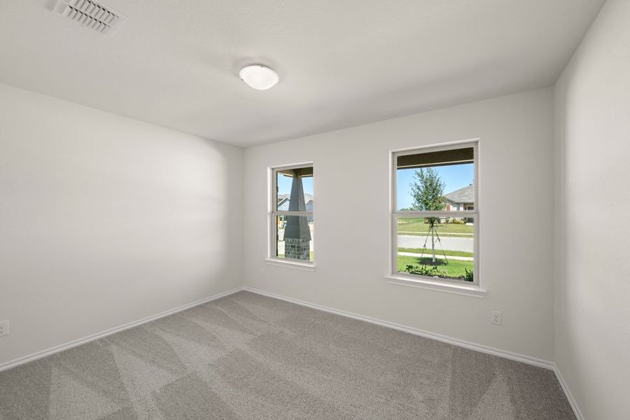 Front exterior of a new home in Baker Farms, Cleburne, TX, highlighting curb appeal (Image 23). Front exterior of a new home in Baker Farms, Cleburne, TX, highlighting curb appeal (Image 23).