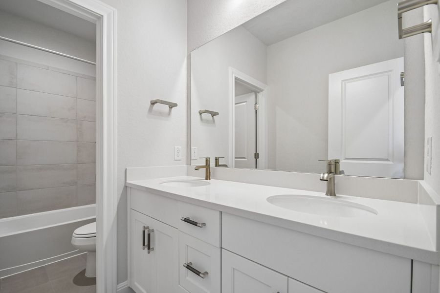 Furnished interior view inside a new home in 6 Creeks, Kyle (Image 10).
